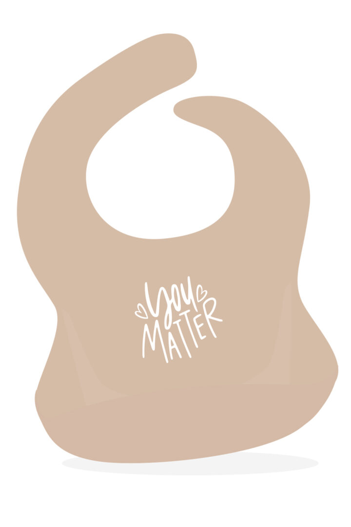 Sandfärgad haklapp i mjuk silikon: You matter